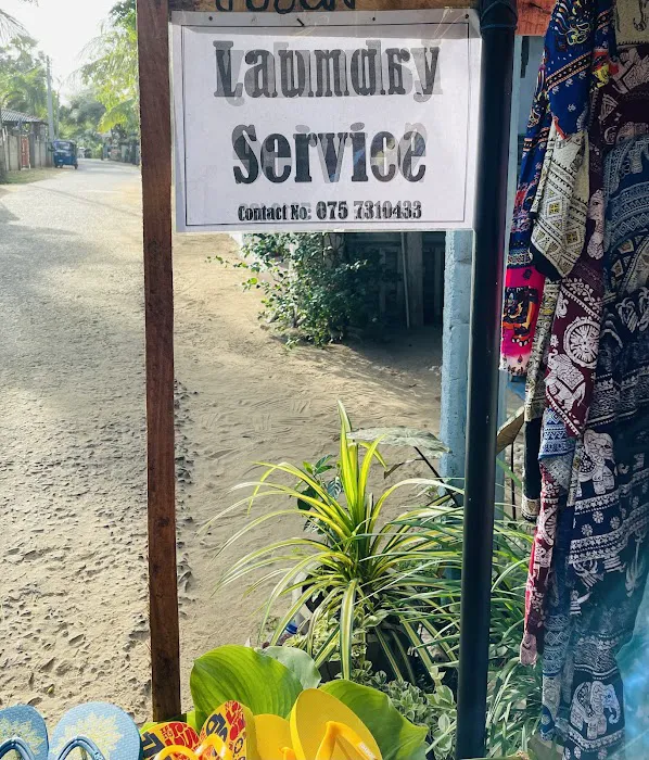 Yogan stores & Laundry Service Picture 6